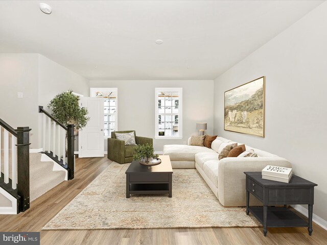 108 Spring Bank Way, Frederick, MD 21701 - living area featuring stairs and wood finished floors
