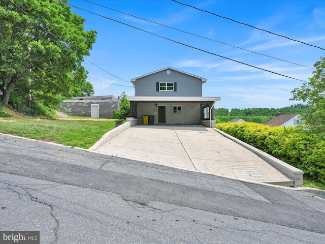 20 E Market St, Schuylkill Haven, PA 17972 - traditional-style house with a carport and concrete driveway