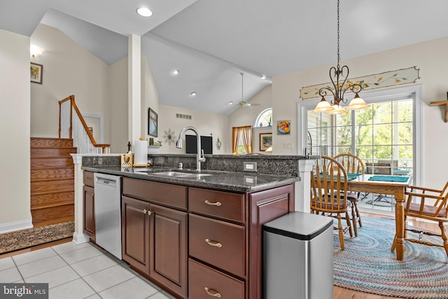 230 Bobwhite Rd, New Hope, PA 18938 - kitchen featuring dishwasher, a sink, lofted ceiling, dark stone countertops, and hanging light fixtures