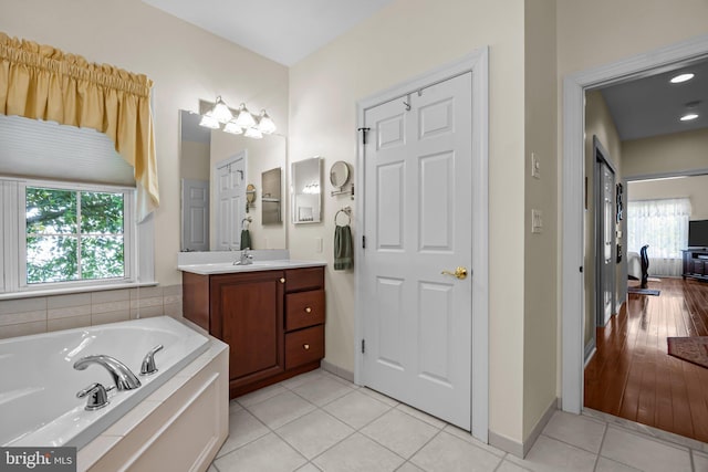 230 Bobwhite Rd, New Hope, PA 18938 - bathroom with vanity, a garden tub, tile patterned flooring, and baseboards