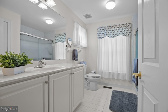 230 Bobwhite Rd, New Hope, PA 18938 - bathroom featuring tile patterned flooring, vanity, toilet, and enclosed tub / shower combo