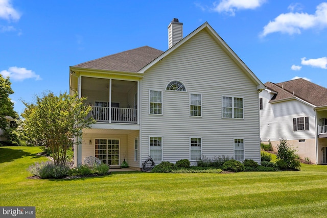 230 Bobwhite Rd, New Hope, PA 18938 - back of property featuring a chimney, a lawn, and roof with shingles