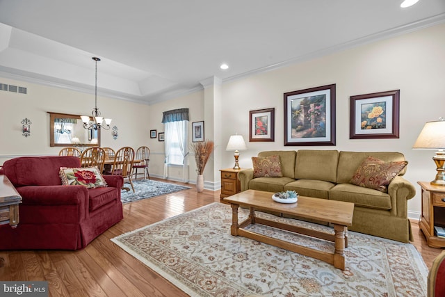230 Bobwhite Rd, New Hope, PA 18938 - living room with recessed lighting, wood finished floors, a chandelier, baseboards, and crown molding