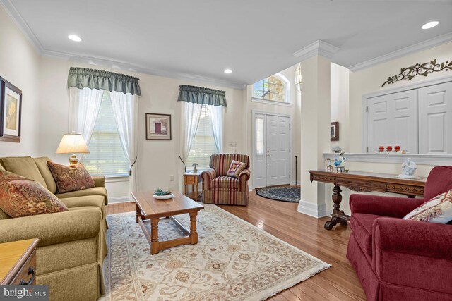 230 Bobwhite Rd, New Hope, PA 18938 - living area with crown molding, wood finished floors, baseboards, and recessed lighting