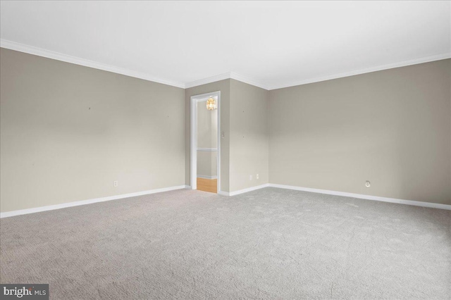 3203 Falcon Ln Ste 311, Wilmington, DE 19808 - spare room featuring baseboards, crown molding, and carpet