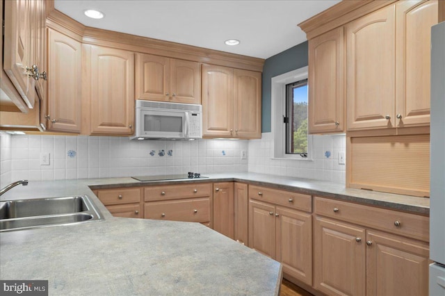 3203 Falcon Ln Ste 311, Wilmington, DE 19808 - kitchen featuring white microwave, a sink, black electric stovetop, light brown cabinetry, and recessed lighting