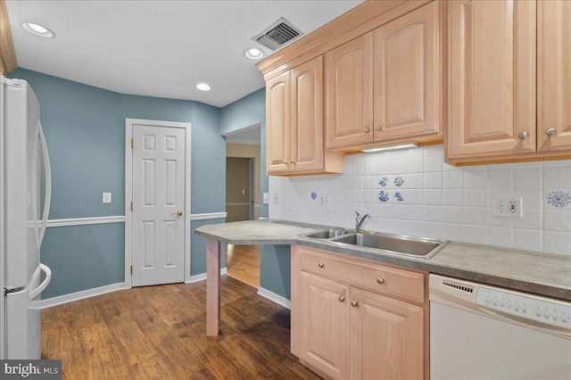 3203 Falcon Ln Ste 311, Wilmington, DE 19808 - kitchen with white appliances, a sink, light brown cabinetry, dark wood-style flooring, and tasteful backsplash