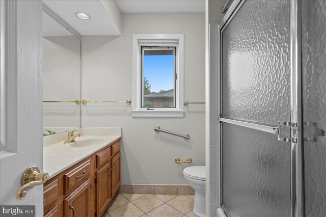 3203 Falcon Ln Ste 311, Wilmington, DE 19808 - full bathroom featuring tile patterned floors, vanity, toilet, a stall shower, and baseboards