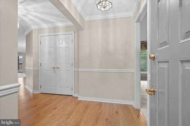 3203 Falcon Ln Ste 311, Wilmington, DE 19808 - entryway with crown molding, wood finished floors, a chandelier, and baseboards