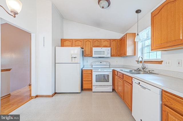 1627 Kindle Ave, Deptford, NJ 08096 - kitchen featuring white appliances, a sink, vaulted ceiling, light floors, and light countertops