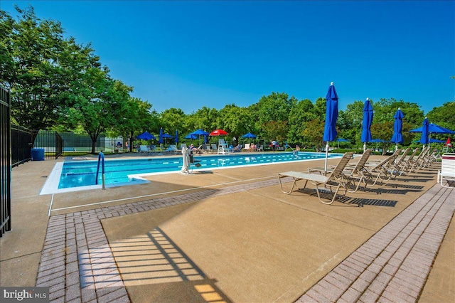 2500 Waterside Dr Unit 110, Frederick, MD 21701 - community pool featuring a patio