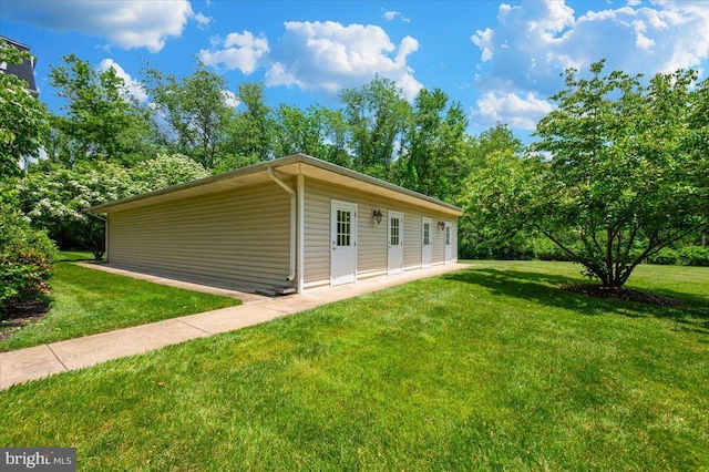 2500 Waterside Dr Unit 110, Frederick, MD 21701 - view of home's exterior with a yard