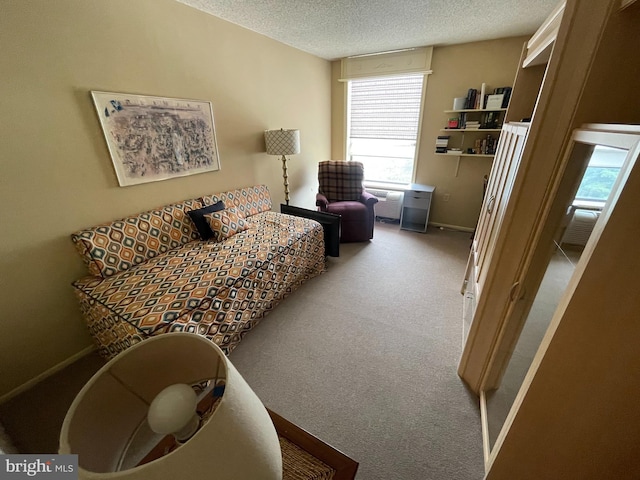 666 W Germantown Pike Unit 1721, Plymouth Meeting, PA 19462 - carpeted living area featuring plenty of natural light, a textured ceiling, and baseboards
