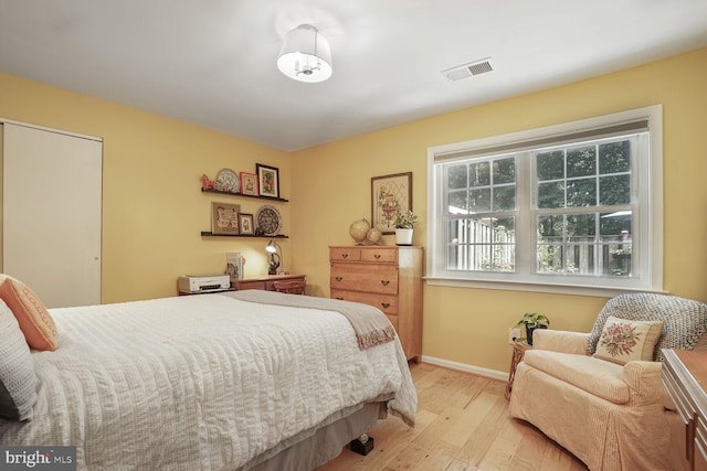 6072 Old Landing Way Unit 48, Burke, VA 22015 - bedroom with light wood finished floors and baseboards