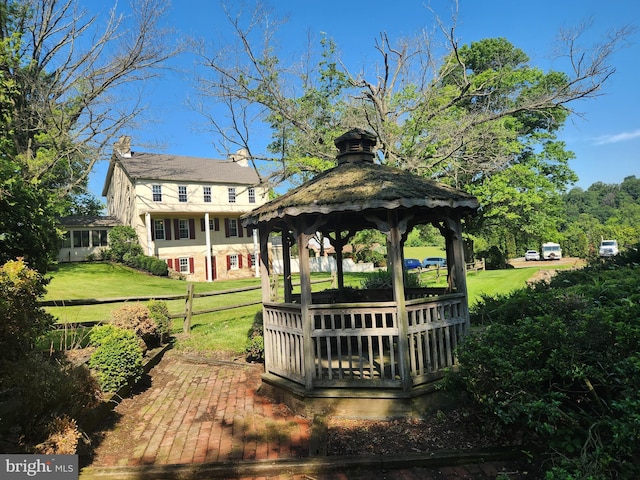 4560 Bossler Rd, Elizabethtown, PA 17022 - back of house with a yard, a gazebo, and a chimney