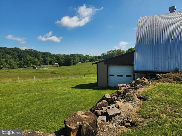 4560 Bossler Rd, Elizabethtown, PA 17022 - view of yard featuring an outdoor structure, a detached garage, and a view of rural / pastoral area