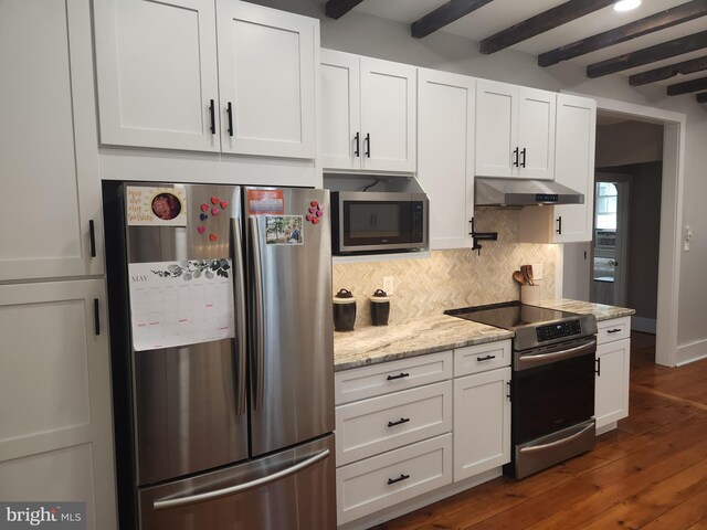 4560 Bossler Rd, Elizabethtown, PA 17022 - kitchen featuring appliances with stainless steel finishes, under cabinet range hood, beam ceiling, decorative backsplash, and white cabinetry