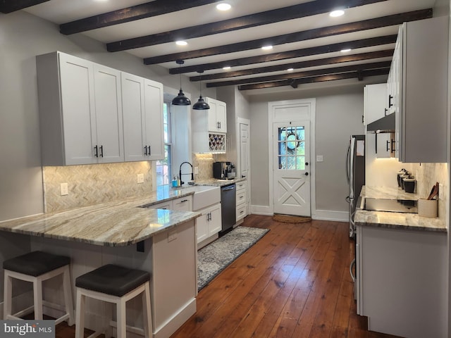 4560 Bossler Rd, Elizabethtown, PA 17022 - kitchen with stainless steel appliances, a sink, light stone counters, baseboards, and tasteful backsplash