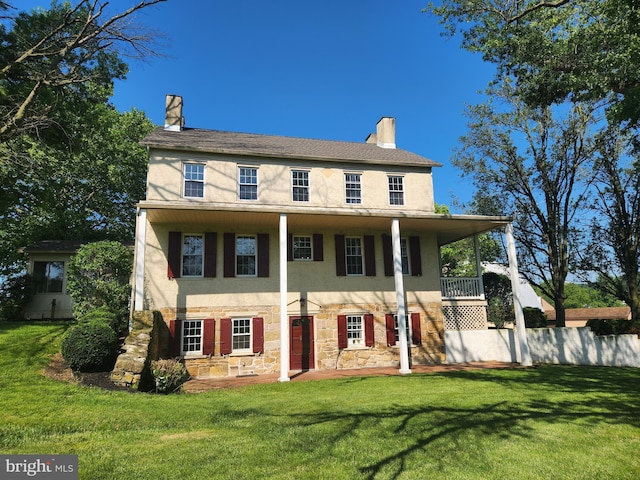 4560 Bossler Rd, Elizabethtown, PA 17022 - view of front of home with stucco siding, stone siding, a chimney, and a patio