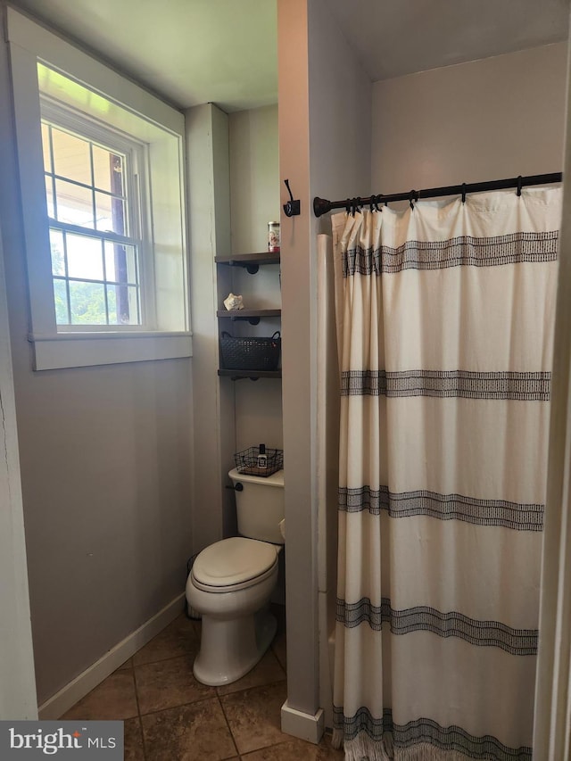 4560 Bossler Rd, Elizabethtown, PA 17022 - full bathroom featuring toilet, baseboards, tile patterned flooring, and a shower with shower curtain