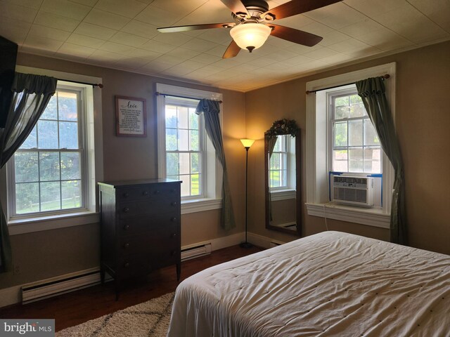 4560 Bossler Rd, Elizabethtown, PA 17022 - bedroom with a baseboard radiator, multiple windows, wood finished floors, and crown molding