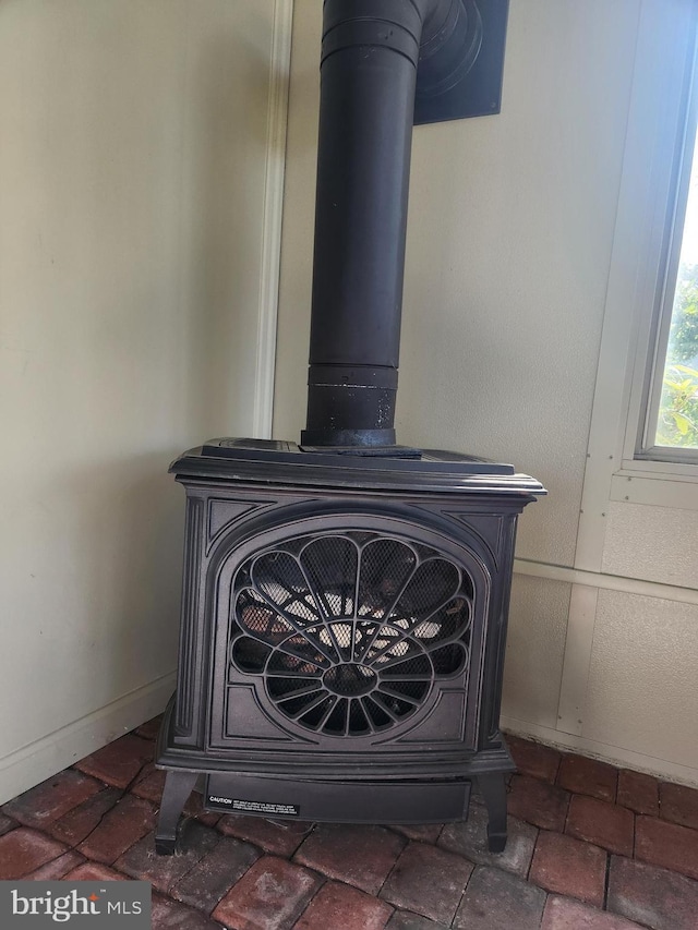4560 Bossler Rd, Elizabethtown, PA 17022 - detailed view of a wood stove and baseboards