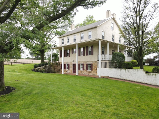 4560 Bossler Rd, Elizabethtown, PA 17022 - view of front of house with a chimney, stucco siding, and stone siding