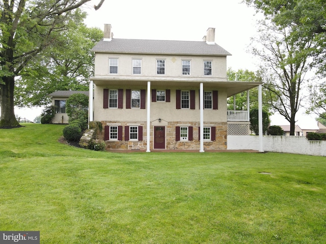 4560 Bossler Rd, Elizabethtown, PA 17022 - view of front facade featuring stone siding, a chimney, and stucco siding