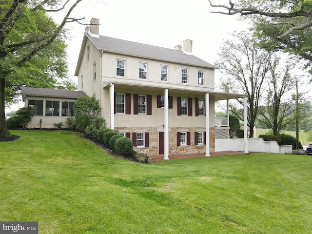4560 Bossler Rd, Elizabethtown, PA 17022 - view of front of house with a chimney, stone siding, and a front yard