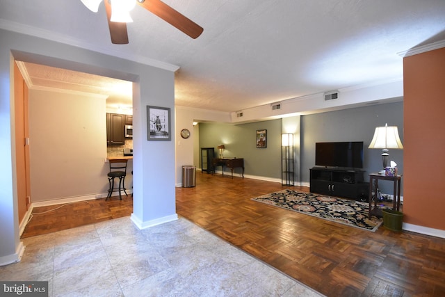 80 W Baltimore Ave, Lansdowne, PA 19050 - living room featuring ornamental molding, a ceiling fan, and baseboards
