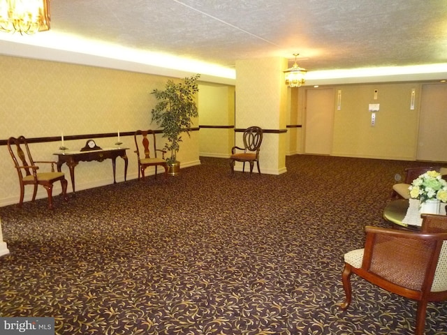 80 W Baltimore Ave, Lansdowne, PA 19050 - living area with carpet floors, a chandelier, baseboards, and wallpapered walls
