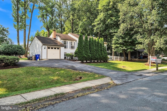 3818 Gelding Ln, Olney, MD 20832 - view of front facade with driveway, an outdoor structure, and a garage