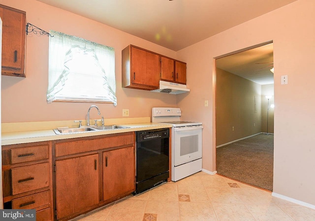 962 Wampler Ln, Westminster, MD 21158 - kitchen featuring black dishwasher, white range with electric cooktop, a sink, under cabinet range hood, and brown cabinetry