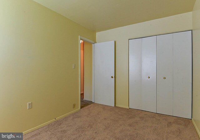 962 Wampler Ln, Westminster, MD 21158 - unfurnished bedroom with carpet flooring, a closet, and baseboards