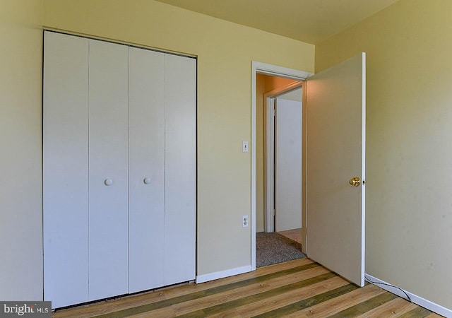 962 Wampler Ln, Westminster, MD 21158 - unfurnished bedroom featuring wood finished floors and a closet