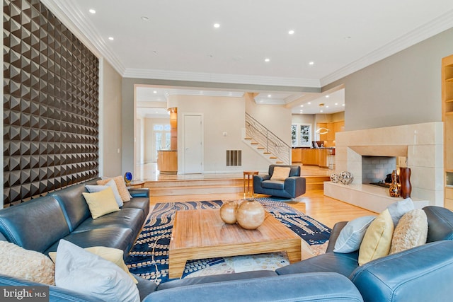 918 Centrillion Dr, Mclean, VA 22102 - living area featuring wood finished floors, crown molding, stairs, a fireplace, and recessed lighting