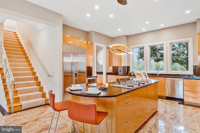 918 Centrillion Dr, Mclean, VA 22102 - kitchen with appliances with stainless steel finishes, dark countertops, recessed lighting, a sink, and a center island