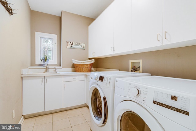 918 Centrillion Dr, Mclean, VA 22102 - washroom featuring cabinet space, independent washer and dryer, and light tile patterned floors