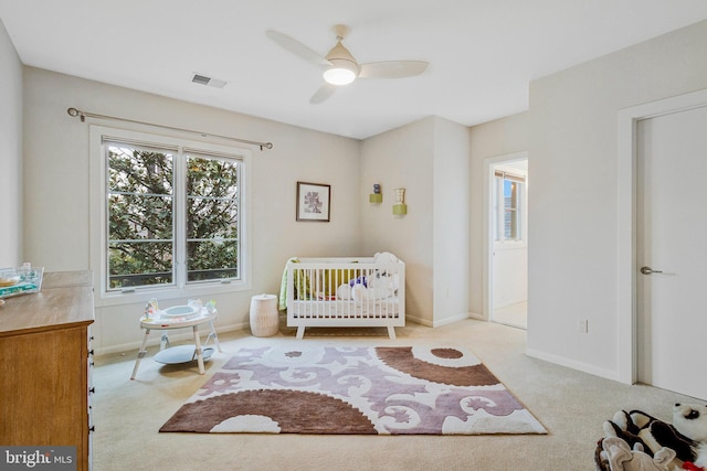 918 Centrillion Dr, Mclean, VA 22102 - carpeted bedroom with baseboards, a crib, and a ceiling fan