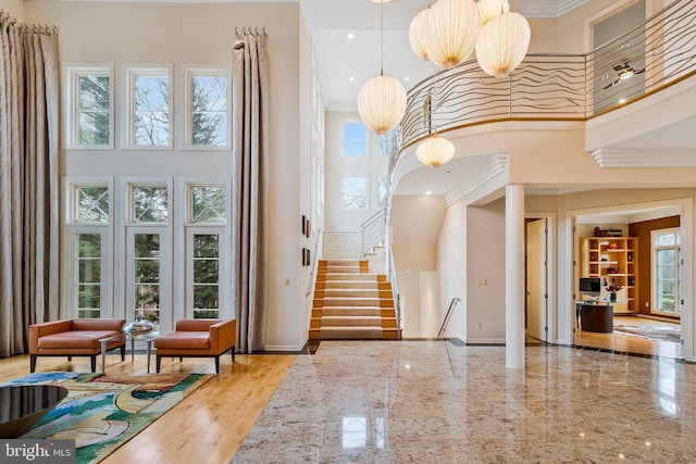918 Centrillion Dr, Mclean, VA 22102 - foyer entrance featuring a high ceiling, stairs, baseboards, and ornamental molding