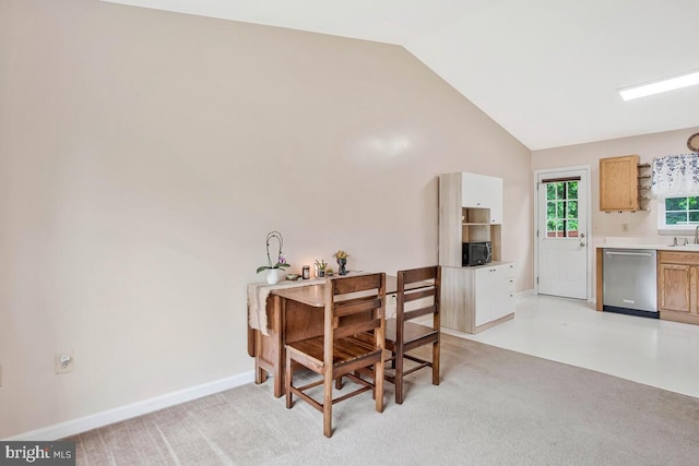 6040 Shady Side Rd, Shady Side, MD 20764 - dining space with lofted ceiling and baseboards