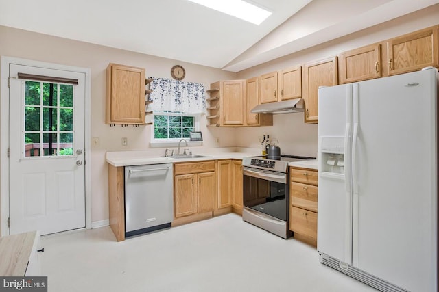 6040 Shady Side Rd, Shady Side, MD 20764 - kitchen with appliances with stainless steel finishes, light brown cabinets, under cabinet range hood, lofted ceiling, and healthy amount of natural light