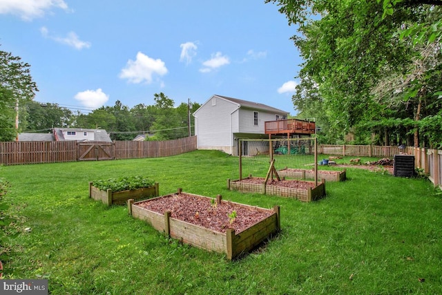 6040 Shady Side Rd, Shady Side, MD 20764 - fenced backyard with a vegetable garden and a deck