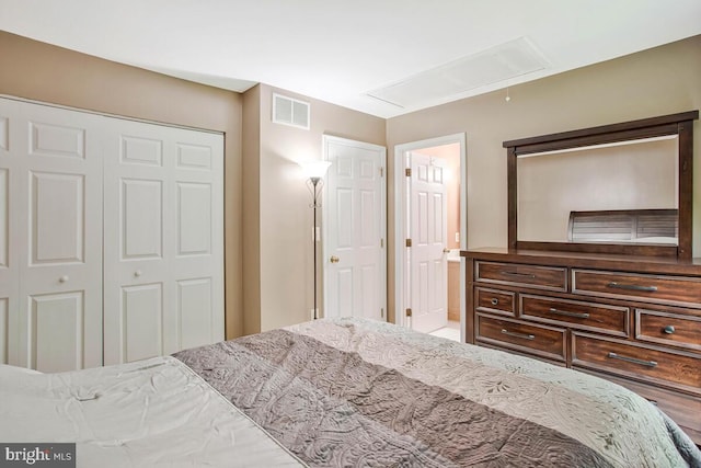 6040 Shady Side Rd, Shady Side, MD 20764 - bedroom featuring attic access, a closet, and ensuite bathroom