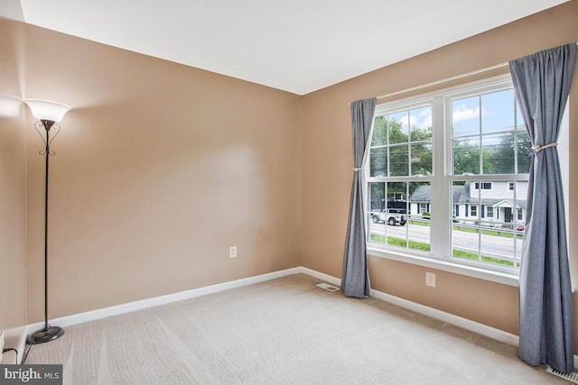 6040 Shady Side Rd, Shady Side, MD 20764 - carpeted spare room with baseboards