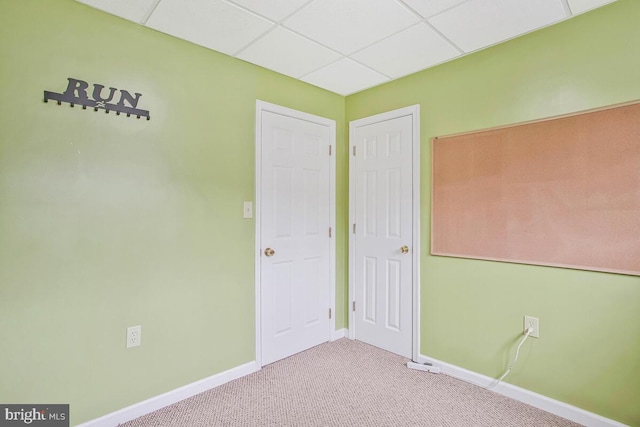 6040 Shady Side Rd, Shady Side, MD 20764 - unfurnished bedroom featuring carpet and a drop ceiling