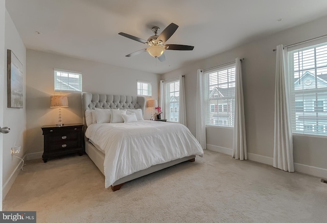 45375 Concord Way, California, MD 20619 - bedroom with baseboards, light carpet, and ceiling fan