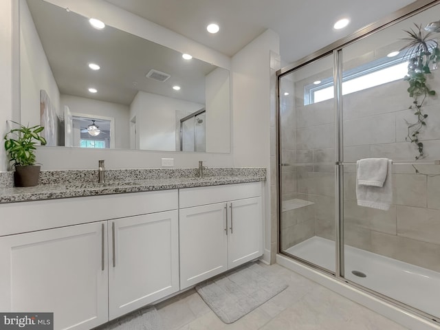 45375 Concord Way, California, MD 20619 - full bath featuring double vanity, a shower stall, recessed lighting, ceiling fan, and marble finish flooring