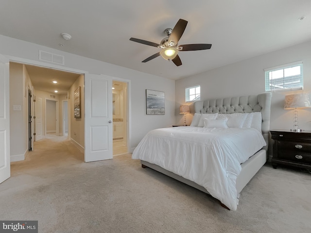 45375 Concord Way, California, MD 20619 - bedroom with light carpet, multiple windows, ceiling fan, and ensuite bath