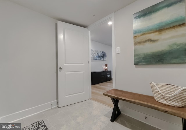 45375 Concord Way, California, MD 20619 - corridor with light tile patterned floors and baseboards